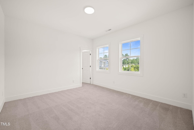 525 Kings Lake Way, Durham, NC 27703 - carpeted empty room featuring baseboards