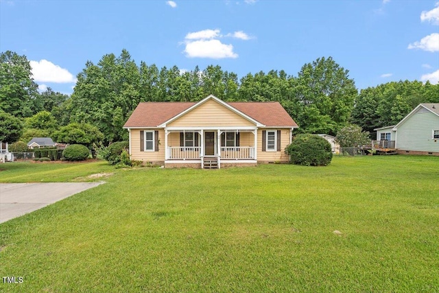 34 Scotts Creek Run, Angier, NC 27501 - view of front of home featuring crawl space, covered porch, and a front yard