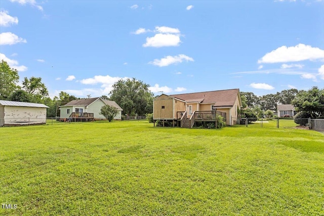 34 Scotts Creek Run, Angier, NC 27501 - fenced backyard featuring a wooden deck