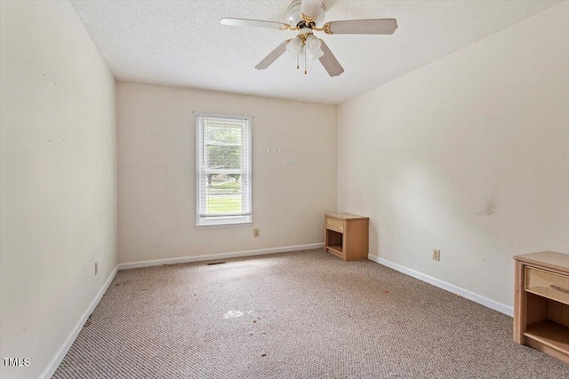 34 Scotts Creek Run, Angier, NC 27501 - unfurnished room with light colored carpet, a ceiling fan, and a textured ceiling