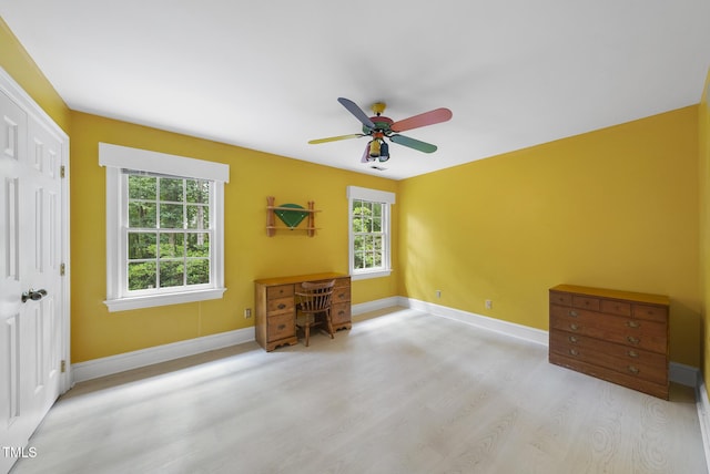 821 Ascot Ln, Raleigh, NC 27615 - bedroom with wood finished floors, ceiling fan, and a closet