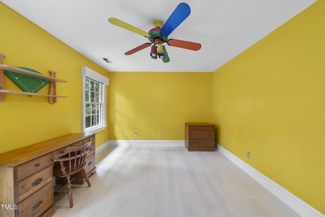 821 Ascot Ln, Raleigh, NC 27615 - unfurnished office with wood finished floors, ceiling fan, and built in study area