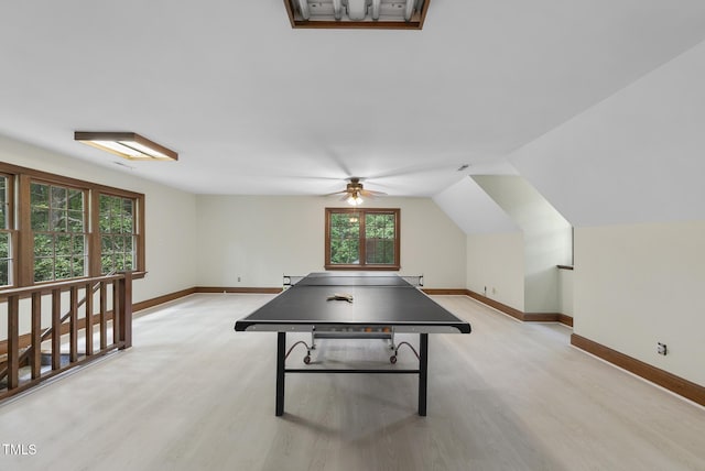 821 Ascot Ln, Raleigh, NC 27615 - game room with light wood finished floors, a ceiling fan, and lofted ceiling