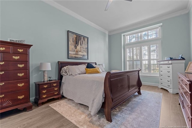 82 Pine Hawk Dr, Spring Lake, NC 28390 - bedroom featuring crown molding, light wood-style floors, and ceiling fan