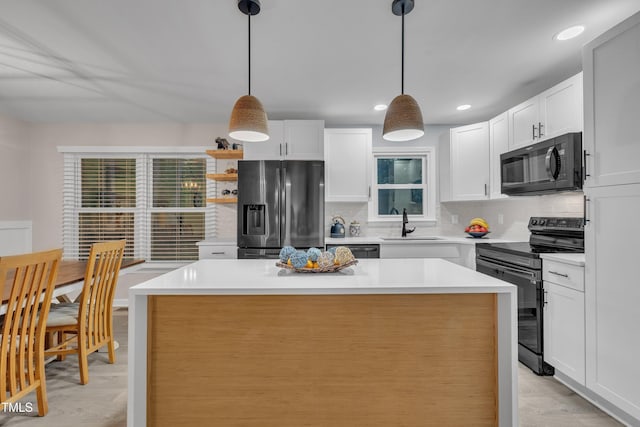 8801 Valley Hill Ct, Apex, NC 27539 - kitchen featuring black appliances, backsplash, light wood finished floors, white cabinetry, and recessed lighting
