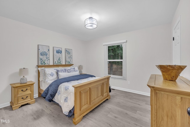 8801 Valley Hill Ct, Apex, NC 27539 - bedroom with light wood-style flooring
