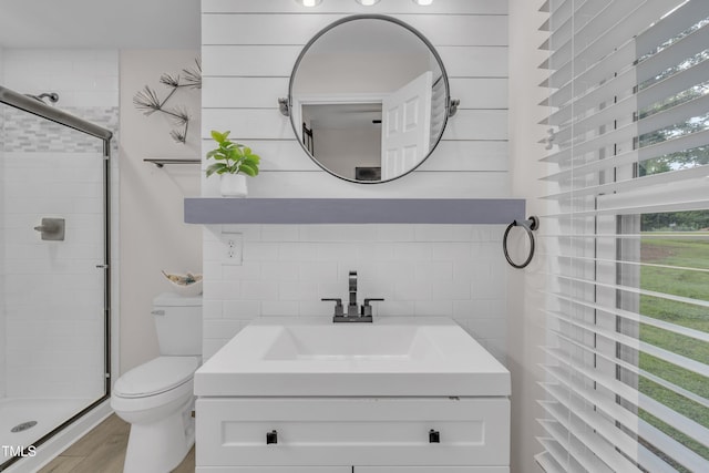 8801 Valley Hill Ct, Apex, NC 27539 - bathroom with a stall shower, vanity, and wood finished floors