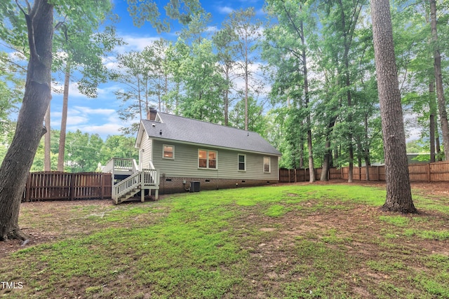 8801 Valley Hill Ct, Apex, NC 27539 - back of property with crawl space, a fenced backyard, roof with shingles, stairway, and a wooden deck