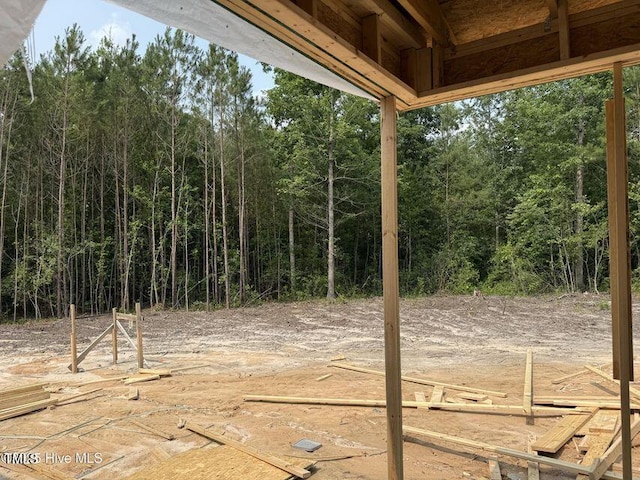 570 Harrow Dr, Carthage, NC 28327 - view of patio featuring a forest view