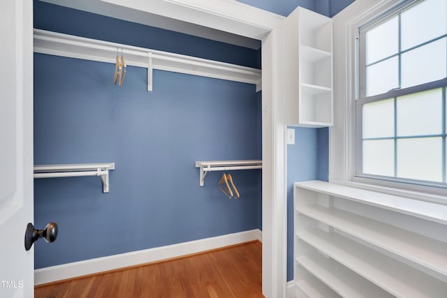 1007 W Markham Ave, Durham, NC 27701 - walk in closet with wood finished floors