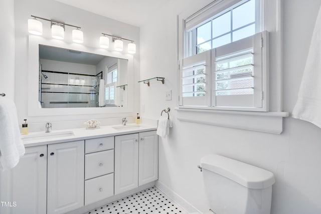 1007 W Markham Ave, Durham, NC 27701 - bathroom with double vanity and a tile shower