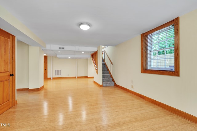 1007 W Markham Ave, Durham, NC 27701 - empty room with light wood finished floors, stairway, and recessed lighting