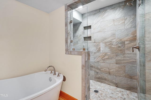 1007 W Markham Ave, Durham, NC 27701 - bathroom featuring a soaking tub and walk in shower