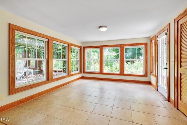 1007 W Markham Ave, Durham, NC 27701 - unfurnished sunroom featuring french doors and tile patterned floors