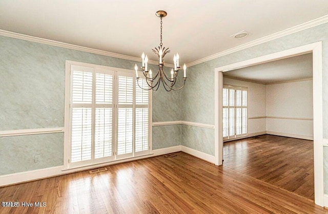 322 Gravley Dr, Rocky Mount, NC 27804 - spare room featuring a chandelier, wood finished floors, and crown molding