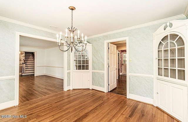 322 Gravley Dr, Rocky Mount, NC 27804 - unfurnished dining area with stairs, wood finished floors, a chandelier, and ornamental molding