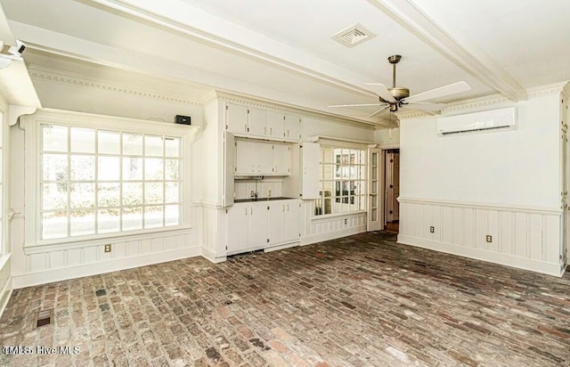 322 Gravley Dr, Rocky Mount, NC 27804 - unfurnished living room with a wall mounted air conditioner, a ceiling fan, brick flooring, beam ceiling, and a decorative wall