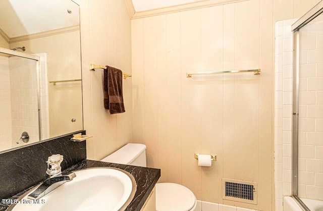 322 Gravley Dr, Rocky Mount, NC 27804 - full bath featuring vanity, ornamental molding, and combined bath / shower with glass door