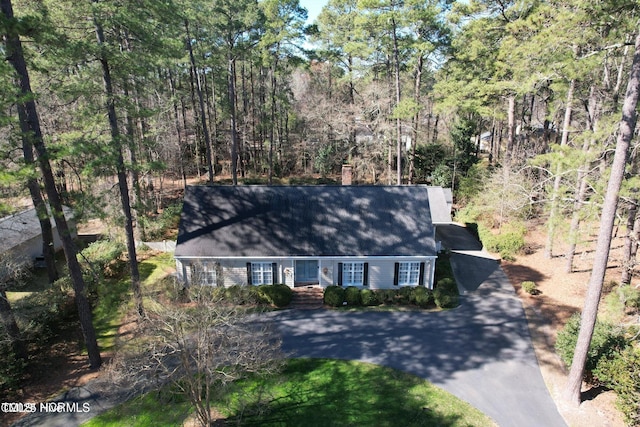 322 Gravley Dr, Rocky Mount, NC 27804 - view of front of home with driveway and a chimney
