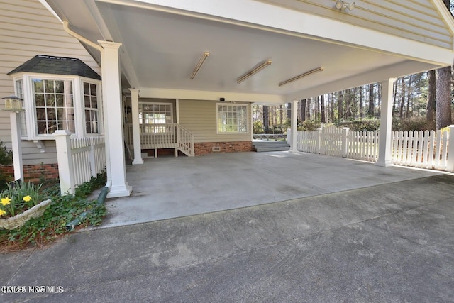 322 Gravley Dr, Rocky Mount, NC 27804 - view of patio featuring a carport