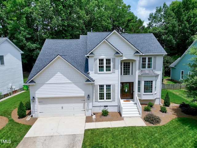 8841 Deerland Grove Dr, Raleigh, NC 27615 - view of front facade with an attached garage, roof with shingles, concrete driveway, and crawl space