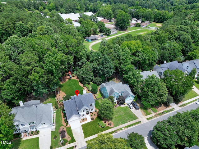 8841 Deerland Grove Dr, Raleigh, NC 27615 - aerial view of residential area featuring a heavily wooded area