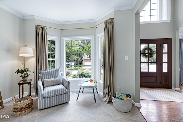 8841 Deerland Grove Dr, Raleigh, NC 27615 - sitting room with ornamental molding and wood finished floors