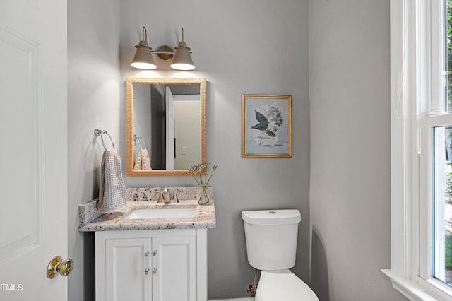 8841 Deerland Grove Dr, Raleigh, NC 27615 - half bathroom with vanity and toilet