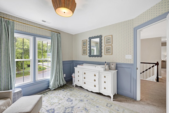 8841 Deerland Grove Dr, Raleigh, NC 27615 - carpeted bedroom with wainscoting and wallpapered walls