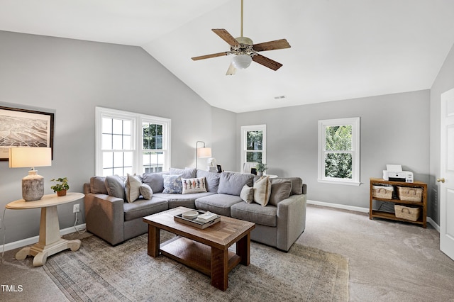 8841 Deerland Grove Dr, Raleigh, NC 27615 - carpeted living area featuring vaulted ceiling, plenty of natural light, and a ceiling fan