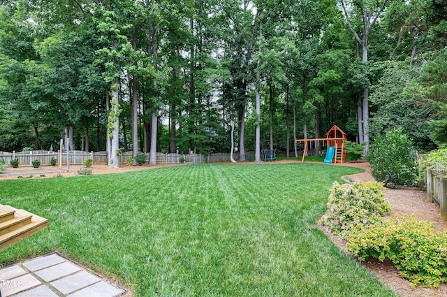 8841 Deerland Grove Dr, Raleigh, NC 27615 - view of yard featuring a playground