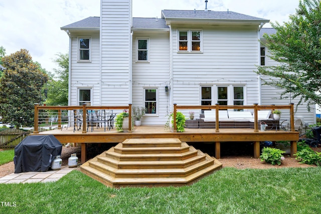 8841 Deerland Grove Dr, Raleigh, NC 27615 - rear view of property featuring a deck, stairs, a chimney, a yard, and a shingled roof