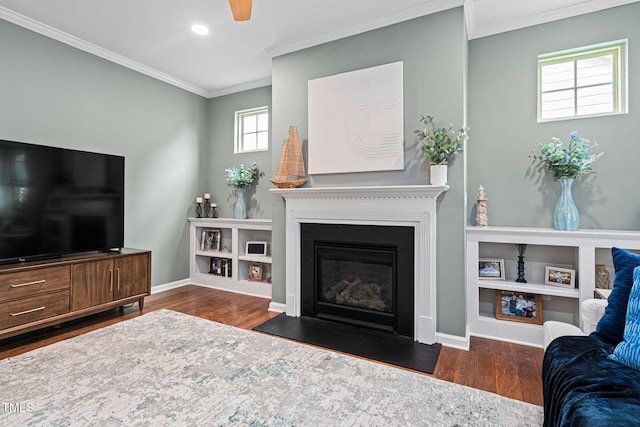1523 Anthology Dr, Durham, NC 27703 - living room with wood finished floors, crown molding, recessed lighting, a fireplace with flush hearth, and ceiling fan