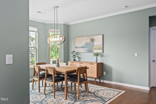 1523 Anthology Dr, Durham, NC 27703 - dining space with a chandelier, wood finished floors, and crown molding