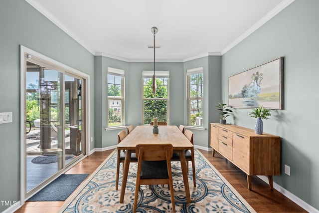 1523 Anthology Dr, Durham, NC 27703 - dining space featuring dark wood finished floors and ornamental molding