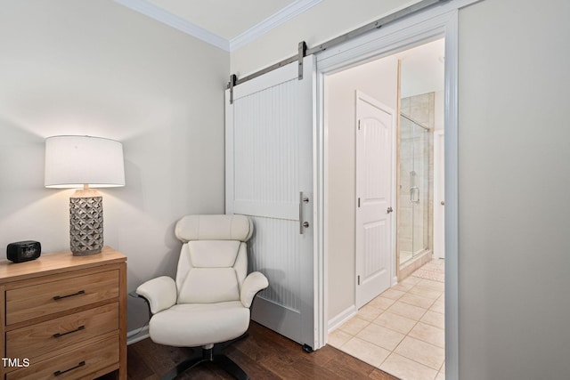 1523 Anthology Dr, Durham, NC 27703 - sitting room featuring ornamental molding, a barn door, and wood finished floors