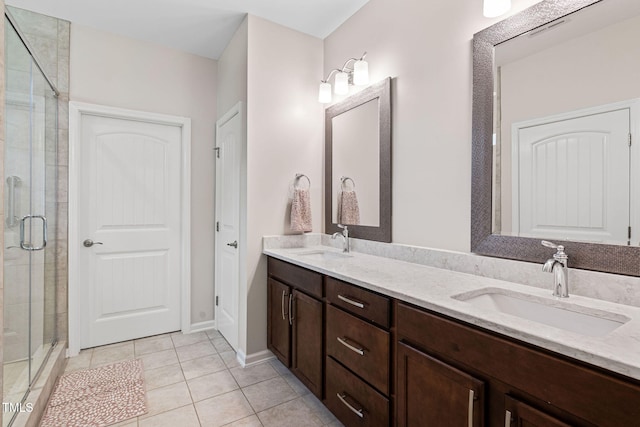 1523 Anthology Dr, Durham, NC 27703 - full bath with a shower stall, double vanity, and tile patterned flooring