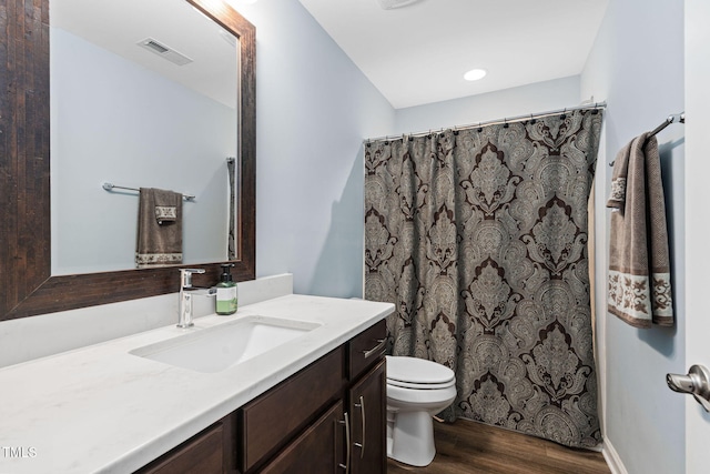 1523 Anthology Dr, Durham, NC 27703 - full bath with wood finished floors, vanity, and curtained shower
