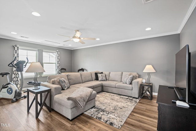 1523 Anthology Dr, Durham, NC 27703 - living room featuring wood finished floors, a ceiling fan, recessed lighting, and ornamental molding
