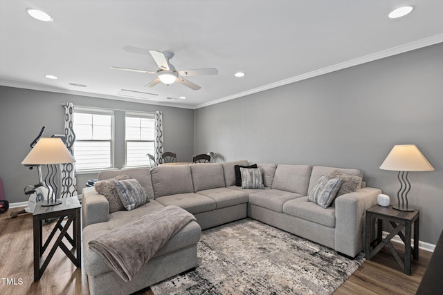 1523 Anthology Dr, Durham, NC 27703 - living room with ornamental molding, wood finished floors, recessed lighting, and ceiling fan