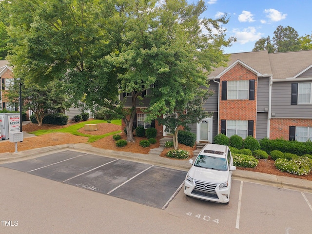 4406 Still Pines Dr, Raleigh, NC 27613 - view of uncovered parking lot