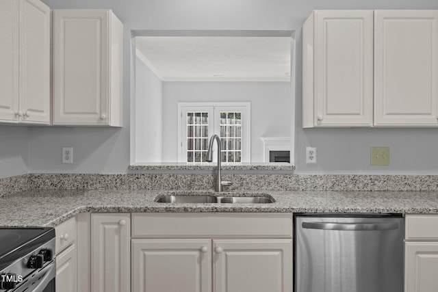 4406 Still Pines Dr, Raleigh, NC 27613 - kitchen featuring appliances with stainless steel finishes, white cabinets, ornamental molding, and light stone counters