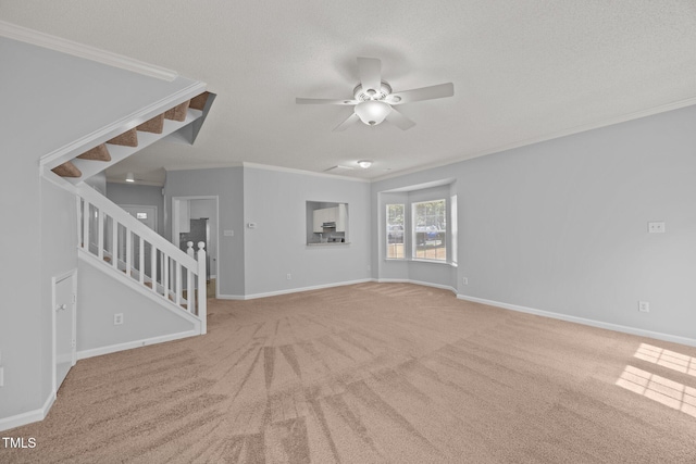 4406 Still Pines Dr, Raleigh, NC 27613 - unfurnished living room with stairs, ornamental molding, carpet, and ceiling fan