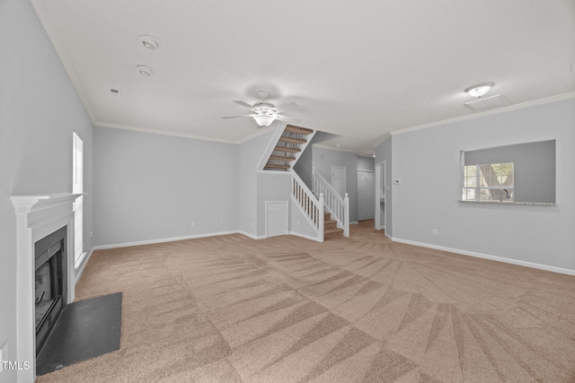 4406 Still Pines Dr, Raleigh, NC 27613 - unfurnished living room featuring carpet flooring, ornamental molding, a ceiling fan, stairs, and a fireplace