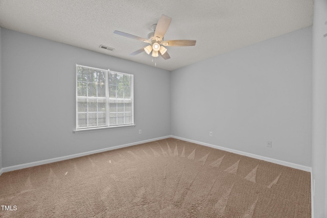 4406 Still Pines Dr, Raleigh, NC 27613 - carpeted empty room with ceiling fan and a textured ceiling