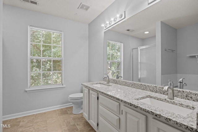 4406 Still Pines Dr, Raleigh, NC 27613 - full bathroom with a stall shower, double vanity, and a tub