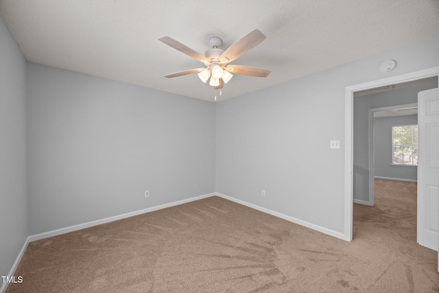 4406 Still Pines Dr, Raleigh, NC 27613 - carpeted spare room featuring a smoke detector and ceiling fan