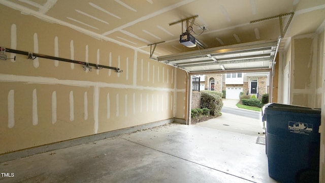 5916 Longeria Ct, Raleigh, NC 27612 - garage featuring a garage door opener