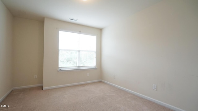 5916 Longeria Ct, Raleigh, NC 27612 - spare room featuring light carpet