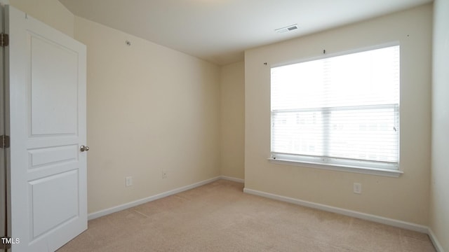 5916 Longeria Ct, Raleigh, NC 27612 - spare room featuring light colored carpet and baseboards